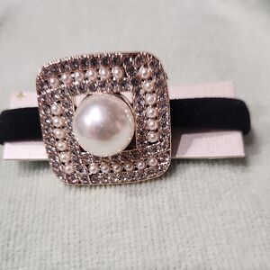 Chic Black and Gold Hair Clip with Pearl Center